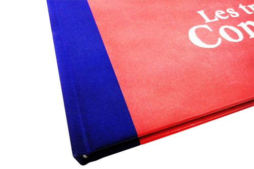 Blue cloth and red paper are a beautiful combination of materials and colors for a hardcover book.